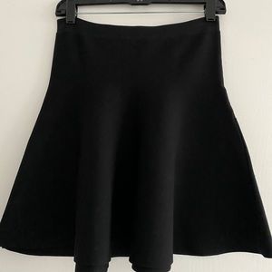 BCBG Maxazria black skater skirt. Size Medium.